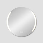 Round mirror with a silver frame on a light gray background
